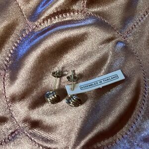 Avon brand new silver pierced earrings.